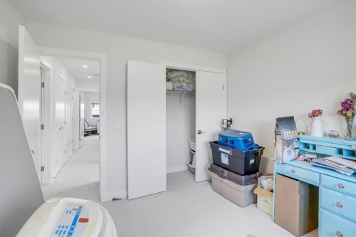 28 Midtown Close Sw, Airdrie, AB - Indoor Photo Showing Bedroom