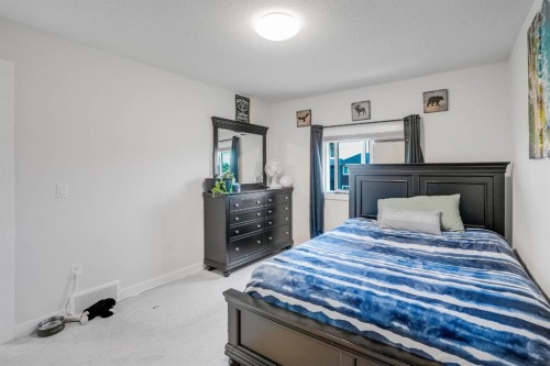 28 Midtown Close Sw, Airdrie, AB - Indoor Photo Showing Bedroom