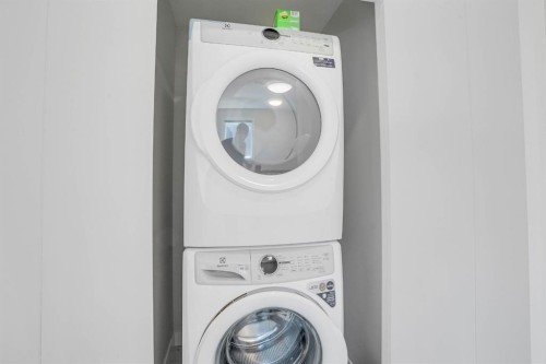 28 Midtown Close Sw, Airdrie, AB - Indoor Photo Showing Laundry Room