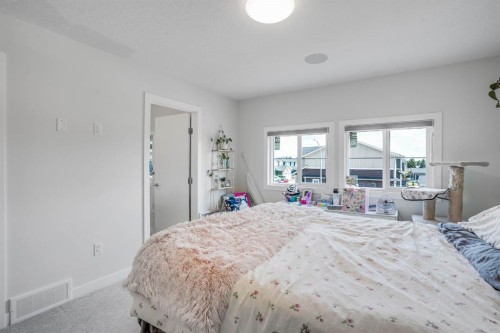 28 Midtown Close Sw, Airdrie, AB - Indoor Photo Showing Bedroom