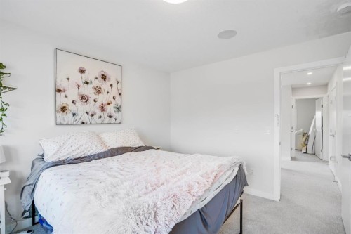 28 Midtown Close Sw, Airdrie, AB - Indoor Photo Showing Bedroom