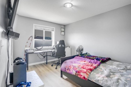 28 Midtown Close Sw, Airdrie, AB - Indoor Photo Showing Bedroom