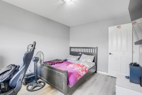 28 Midtown Close Sw, Airdrie, AB - Indoor Photo Showing Bedroom
