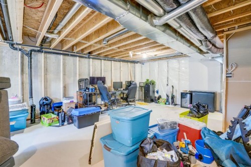 28 Midtown Close Sw, Airdrie, AB - Indoor Photo Showing Basement