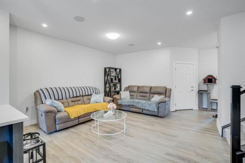 28 Midtown Close Sw, Airdrie, AB - Indoor Photo Showing Living Room