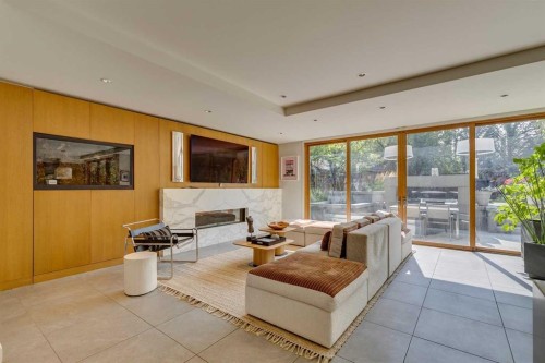 529 Sunderland Avenue Sw, Calgary, AB - Indoor With Fireplace