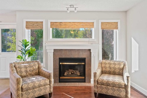 45 Mt Douglas Close Se, Calgary, AB - Indoor Photo Showing Living Room With Fireplace