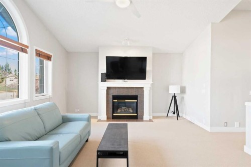 45 Mt Douglas Close Se, Calgary, AB - Indoor Photo Showing Living Room With Fireplace