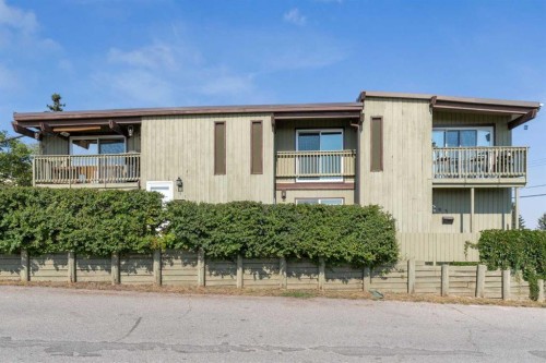 102-7416 Hunterview Drive Nw, Calgary, AB - Outdoor