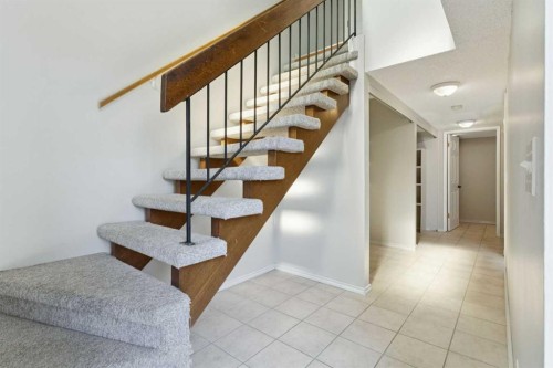 102-7416 Hunterview Drive Nw, Calgary, AB - Indoor Photo Showing Other Room