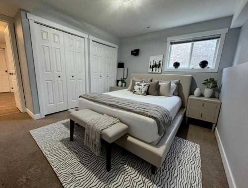 1112 2 Street Ne, Sundre, AB - Indoor Photo Showing Bedroom