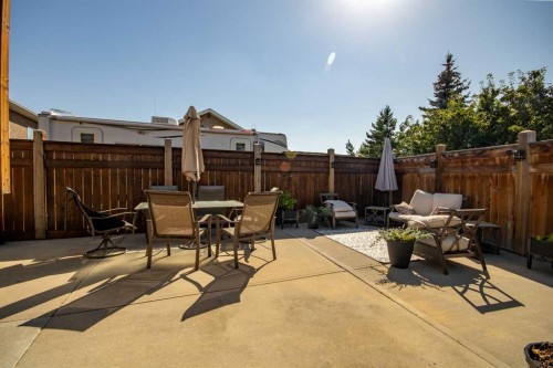1112 2 Street Ne, Sundre, AB - Outdoor With Deck Patio Veranda
