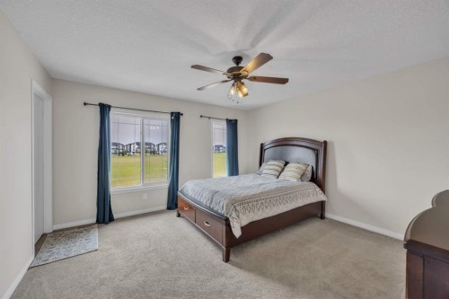 145 Red Sky Way Ne, Calgary, AB - Indoor Photo Showing Bedroom