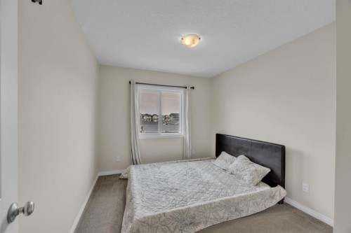 145 Red Sky Way Ne, Calgary, AB - Indoor Photo Showing Bedroom