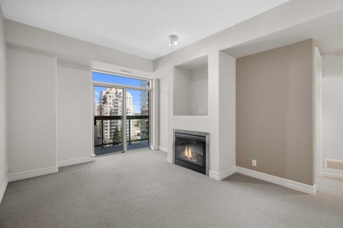 1108-836 15 Avenue Sw, Calgary, AB - Indoor Photo Showing Living Room With Fireplace