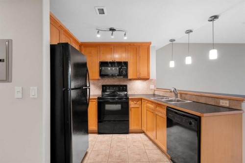 1108-836 15 Avenue Sw, Calgary, AB - Indoor Photo Showing Kitchen With Double Sink