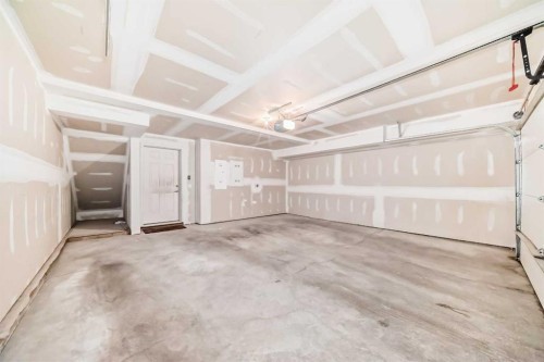 59 Nolanlake Cove Nw, Calgary, AB - Indoor Photo Showing Garage