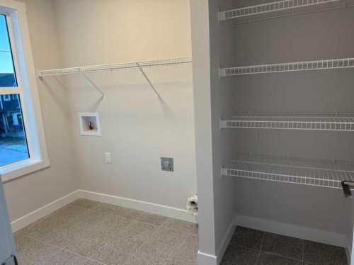 51 Sunrise Heath, Cochrane, AB - Indoor With Storage