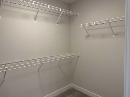 51 Sunrise Heath, Cochrane, AB - Indoor With Storage