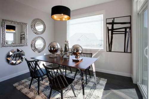 51 Sunrise Heath, Cochrane, AB - Indoor Photo Showing Dining Room