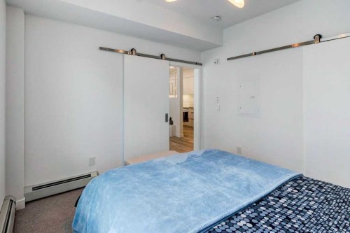 206-3130 Thirsk Street Nw, Calgary, AB - Indoor Photo Showing Bedroom