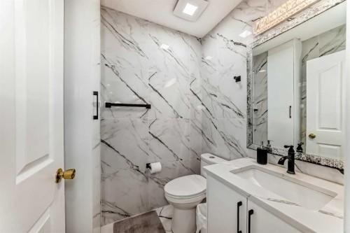 49 Taravista Way Ne, Calgary, AB - Indoor Photo Showing Bathroom