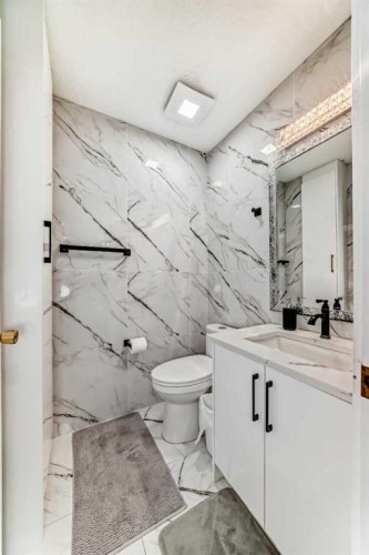 49 Taravista Way Ne, Calgary, AB - Indoor Photo Showing Bathroom