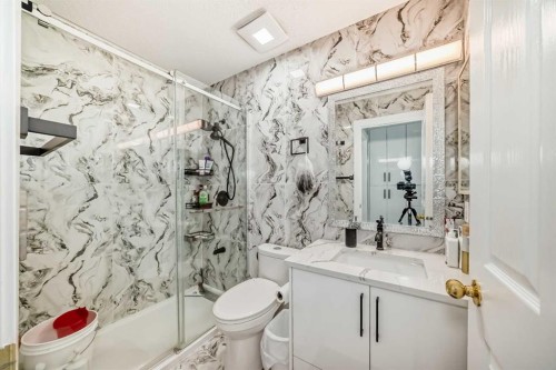 49 Taravista Way Ne, Calgary, AB - Indoor Photo Showing Bathroom