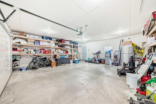 49 Taravista Way Ne, Calgary, AB - Indoor Photo Showing Garage