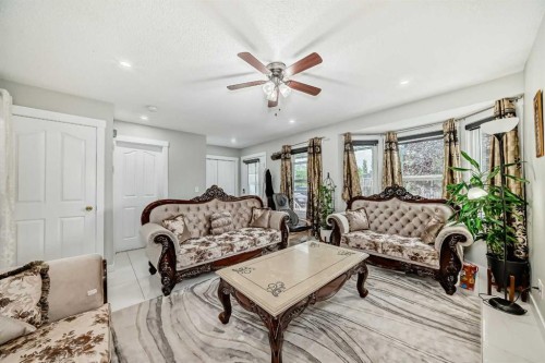 49 Taravista Way Ne, Calgary, AB - Indoor Photo Showing Living Room