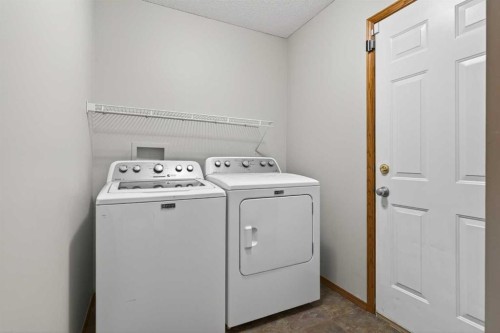 47 Mt Apex Crescent Se, Calgary, AB - Indoor Photo Showing Laundry Room