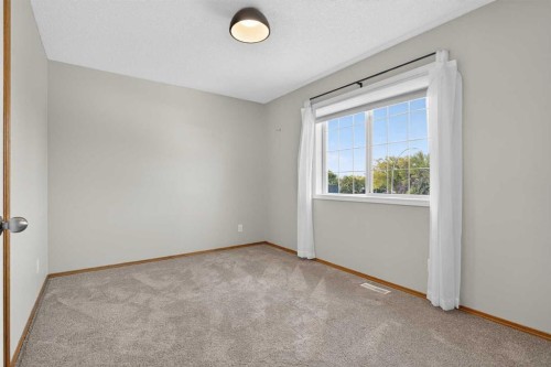 47 Mt Apex Crescent Se, Calgary, AB - Indoor Photo Showing Other Room