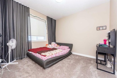 287 Baywater Way Sw, Airdrie, AB - Indoor Photo Showing Bedroom