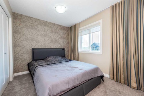 287 Baywater Way Sw, Airdrie, AB - Indoor Photo Showing Bedroom