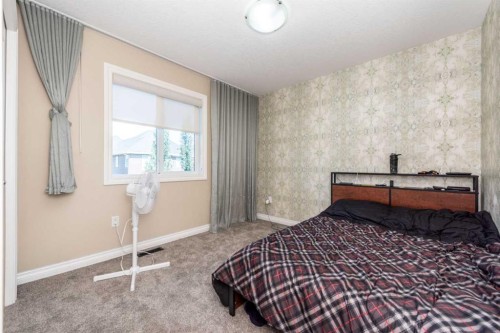 287 Baywater Way Sw, Airdrie, AB - Indoor Photo Showing Bedroom