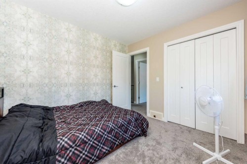 287 Baywater Way Sw, Airdrie, AB - Indoor Photo Showing Bedroom