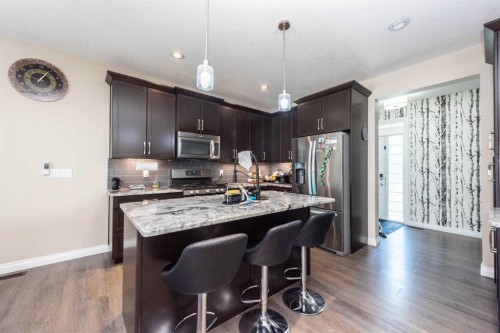 287 Baywater Way Sw, Airdrie, AB - Indoor Photo Showing Kitchen With Stainless Steel Kitchen With Upgraded Kitchen
