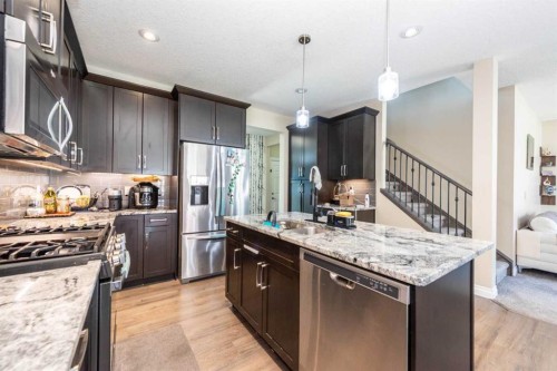 287 Baywater Way Sw, Airdrie, AB - Indoor Photo Showing Kitchen With Stainless Steel Kitchen With Upgraded Kitchen