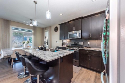 287 Baywater Way Sw, Airdrie, AB - Indoor Photo Showing Kitchen With Stainless Steel Kitchen With Upgraded Kitchen