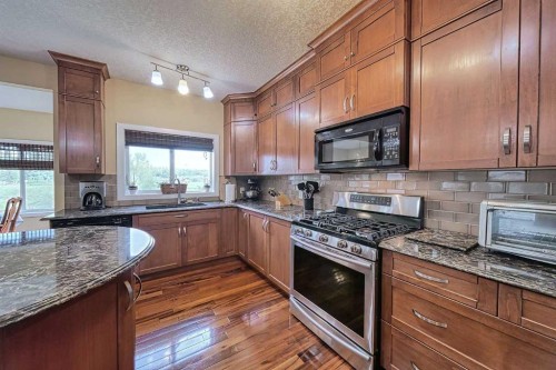 66 Crystal Green Drive, Okotoks, AB - Indoor Photo Showing Kitchen