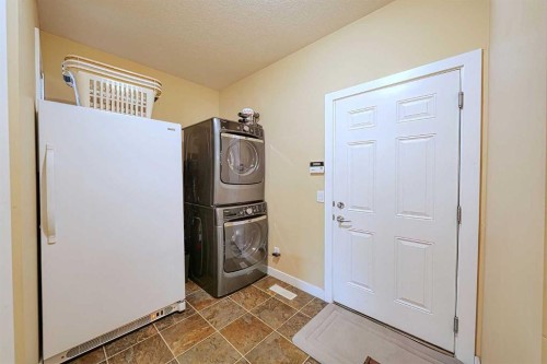 66 Crystal Green Drive, Okotoks, AB - Indoor Photo Showing Laundry Room