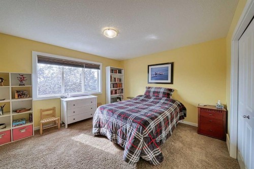 66 Crystal Green Drive, Okotoks, AB - Indoor Photo Showing Bedroom