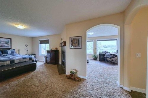 66 Crystal Green Drive, Okotoks, AB - Indoor Photo Showing Bedroom