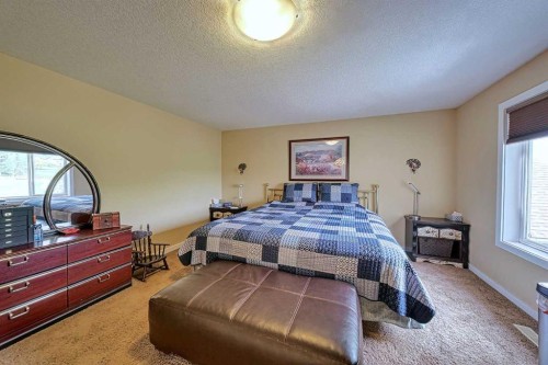 66 Crystal Green Drive, Okotoks, AB - Indoor Photo Showing Bedroom