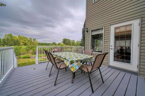 66 Crystal Green Drive, Okotoks, AB - Outdoor With Deck Patio Veranda With Exterior