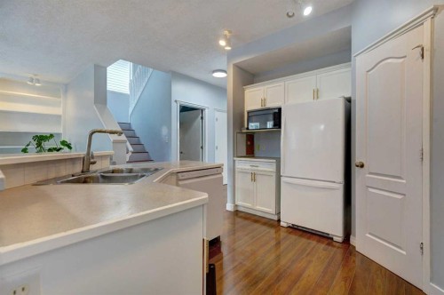 162 Prestwick Landing Se, Calgary, AB - Indoor Photo Showing Kitchen With Double Sink