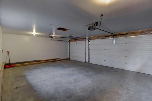 162 Prestwick Landing Se, Calgary, AB - Indoor Photo Showing Garage