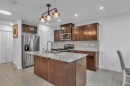 15 Kincora Crescent Nw, Calgary, AB  - Indoor Photo Showing Kitchen With Stainless Steel Kitchen With Double Sink 