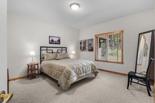 18 Juniper Ridge, Canmore, AB - Indoor Photo Showing Bedroom