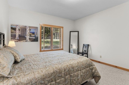 18 Juniper Ridge, Canmore, AB - Indoor Photo Showing Bedroom